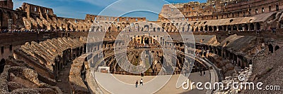 Panorama of the interior of the Roman Colosseum showing the arena and the hypogeum in a beautiful sunny Editorial Stock Photo