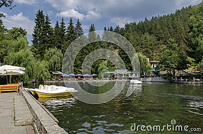 Panorama of lake Kleptuza toward karst spring and varied plant Stock Photo