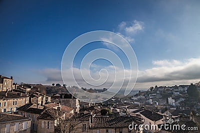 Panorama of the medieval city of Saint Emilion, France with the wineyards in background, during a sunny afternoon. Stock Photo