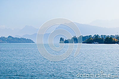 Quatre cantons lake and swiss mountains with mist Stock Photo