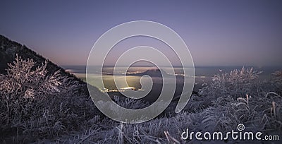 Panorama from Mount Beshtau to the city, a winter landscape in the evening at sunset Stock Photo