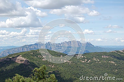 Panorama of the mountains and forests of Bages in Catalonia photographed from the mount of La Mola. View of Montserrat. Stock Photo