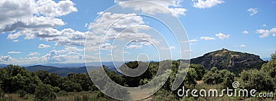 Panorama of the mountains and forests of Bages in Catalonia photographed from the mount of La Mola. View of Montserrat. Stock Photo