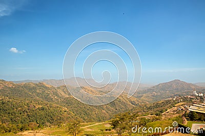 Panorama of mountains and villages in the middle of the valley in the evening Stock Photo