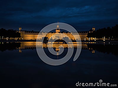 Panorama night reflection of Schloss Karlsruhe Castle Palace Schlosspark in Baden Wurttemberg Germany Europe Stock Photo
