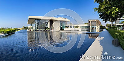 Panorama of the Oberoi Beach Luxury Resort with water features and contemporary architecture in Al Zorah, Ajman, UAE. Editorial Stock Photo