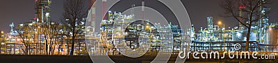 Panorama of oil refinery by night, Poland Stock Photo
