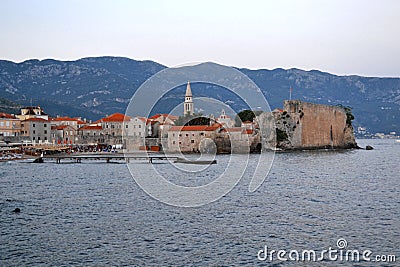 Panorama of old town in Budva Montenegro. Beautiful cityscape above blue sea on sunny day in summer. Sightseeing places to visit. Stock Photo