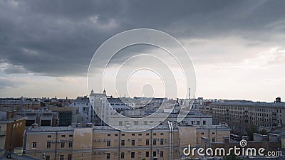 Panorama of old town with gray roofs in cloudy weather. Action. Historical and unremarkable center of city with old Stock Photo