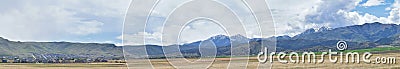 Panorama of Oquirrh Mountain range which includes The Bingham Canyon Mine or Kennecott Copper Mine, rumored the largest open pit c Stock Photo