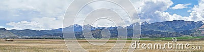 Panorama of Oquirrh Mountain range which includes The Bingham Canyon Mine or Kennecott Copper Mine, rumored the largest open pit c Stock Photo