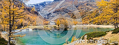 Panorama of the Palu Lake below Piz Palu glacier in Swiss Alps in autumn day Stock Photo