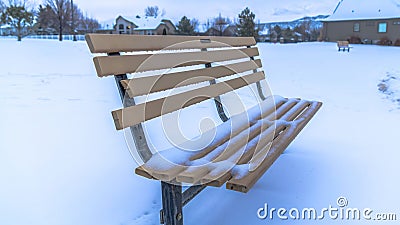 Panorama Picturesque snow covered landscape in winter with empty bench by the Utah Lake Stock Photo