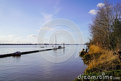 Panorama of a pontoon for mooring boats in winter garonne river france Stock Photo