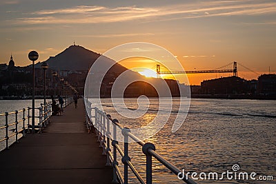 Panorama of Portugalete and Getxo with Hanging Bridge of Bizkaia at sunset, Basque Country, Spain Stock Photo