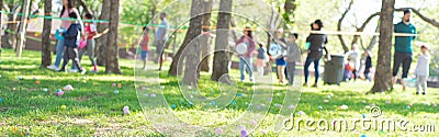 Panorama selective focus long line of diverse kids with parents after brightly colored barricade tape and multicolor Stock Photo