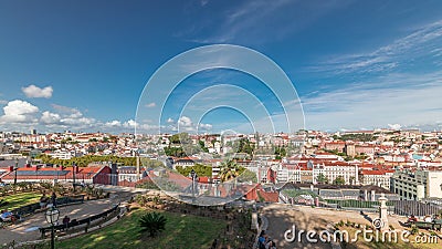Panorama showing aerial view over the center of Lisbon timelapse from Miradouro de Sao Pedro de Alcantara Stock Photo