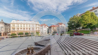 Panorama showing Sulkowski Castle and fountain on Chrobry Square in Bielsko-Biala timelapse, Poland. Stock Photo