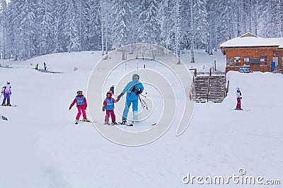 Panorama of ski resort Kopaonik, Serbia, skiers, houses Editorial Stock Photo