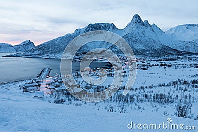 Panorama of snowy fjords and mountain range, Senja, Norway Amazing Norway nature seascape popular tourist attraction. Stock Photo