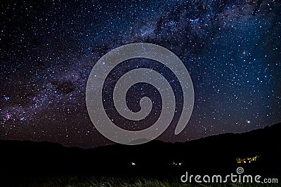 Panorama Starry night Milky way over the mountain. Abel Tasman National Park Stock Photo