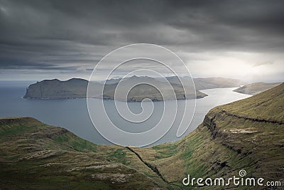 Panorama of Streymoy and Vagar islands with clouds at sunset, Faroe Islands, from the viewpoint at the Sornfelli Observatory. Editorial Stock Photo