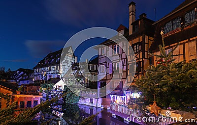 Panorama of traditional Alsatian half-timbered houses and river Lauch in little Venice quarter, old town of Colmar, Alsace, France Stock Photo