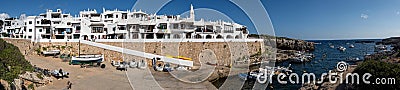 Panorama of Traditional fishing village of Binibeca on the coast of Menorca, Spain. Editorial Stock Photo