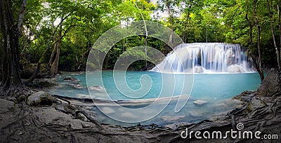 Panorama of tropical forest, waterfall and small pond Stock Photo