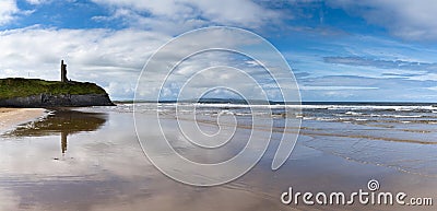 Panorama view of the Ballybunion Castle ruins on the clifftop and Ballybunion Beach in western Ireland Editorial Stock Photo