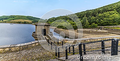 A panorama view from the dam wall towards the wooded shore of Ladybower reservoir, Derbyshire, UK Stock Photo