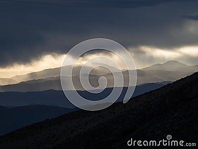 Panorama view of mountain range silhouette layers haze dust fog clouds at Misti volcano Arequipa Peru Andes Stock Photo