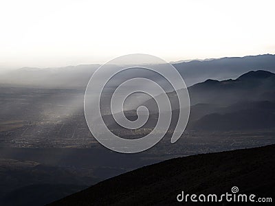 Panorama view of mountain range silhouette layers haze dust fog clouds at Misti volcano Arequipa Peru Andes Stock Photo