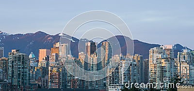 Panorama view over skyline Vancouver downtown with the mountains of north Vancouver in the background Stock Photo