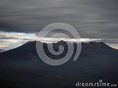 Panorama view of Picchu Picchu mountain inactive volcano haze dust fog clouds from Misti volcano Arequipa Peru Andes Stock Photo