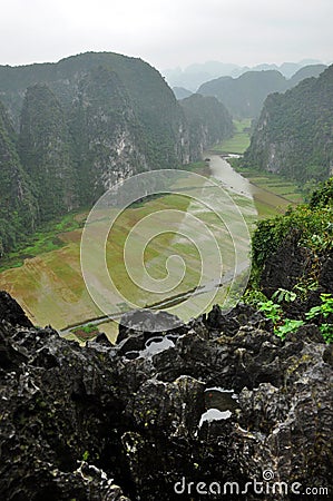 Panorama view of rice fields and limestone rocks from Hang Mua Stock Photo