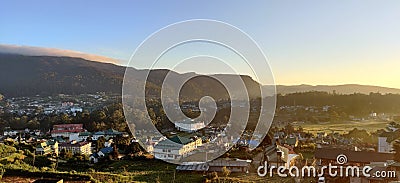 Panorama view of a rural area by the hills during sunrise Editorial Stock Photo