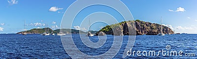 A panorama view sailboats moored of the Pelican Island and the Indian Islets off the main island of Tortola Stock Photo