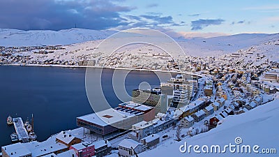 View of snow-covered city center of Hammerfest, Norway, the northernmost town in the world, located at the coast of arctic sea. Stock Photo