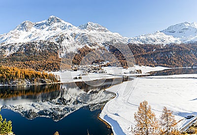 Panorama view of the Swiss Alps town Silvaplana with snow mountain Corvatsch at the background Stock Photo