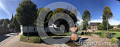 Panorama from village fountain at Quirinusplatz in Millingen Editorial Stock Photo