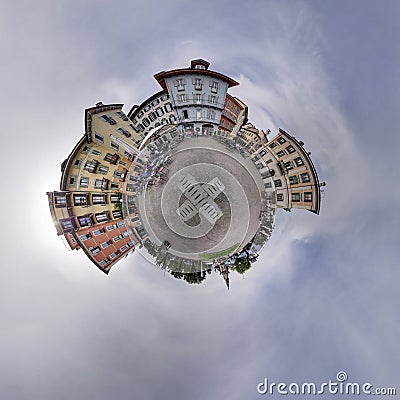 Panorama village square flagging cloudy sky ball hole around Editorial Stock Photo