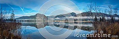 Panorama of Walchsee in Tyrol with reflection in the lake Stock Photo