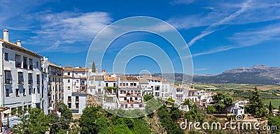 Panorama of white houses on the cliffs of historic city Ronda Stock Photo