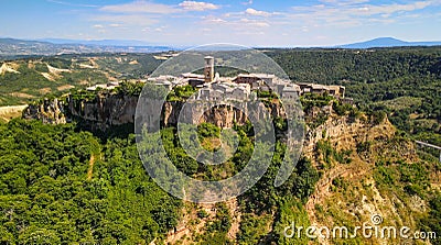 Panoramic aerial view of Civita di Bagnoregio from a flying drone around the medieval city, Italy Stock Photo