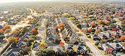 Panoramic aerial view lakeside subdivision with large house and colorful autumn leaves near Dallas Stock Photo