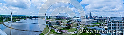 Panoramic Aerial view of Missouri river and the Bob Kerrey pedestrian bridge Omaha Nebraska and adjoining downtown Omaha. Stock Photo