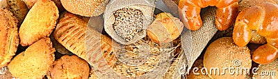 Panoramic background of bread made from wheat and rye flour. Stock Photo