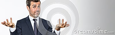 Panoramic banner for happy businessman showing his carefree or irresponsibility Stock Photo
