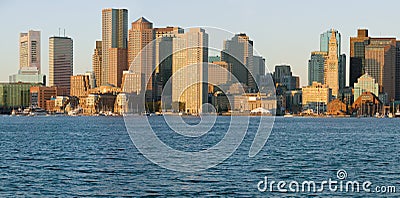 Panoramic of Boston Harbor and the Boston skyline at sunrise as seen from South Boston, Massachusetts, New England Editorial Stock Photo